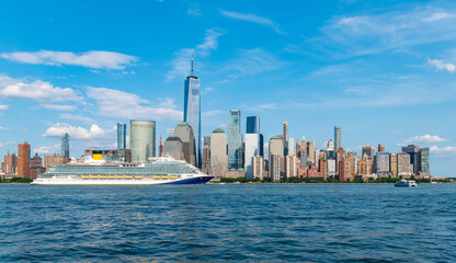 Naklejka premium new york. Cruise ship York. Skyline of New York Manhattan cruising on the Hudson River cruise liner. New york cruise lines ships vacation