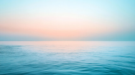 Obraz premium A soft gradient of light blue transitioning into soft coral, with gentle color blending creating a calming, tranquil atmosphere for the background.