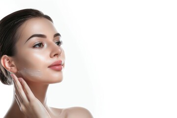 Fototapeta premium A woman relaxing at home with a cream mask on her face, potentially for skin care or pampering