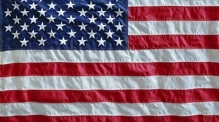 Naklejka premium American Flag waving in the wind. USA, patriotism, freedom, national pride.