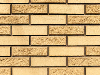 The background is made of yellow and beige brickwork. Design and architecture concept