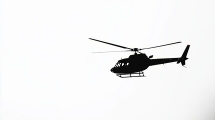 Silhouette of Helicopter in Clear Sky