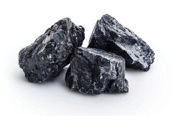 A pile of coal sits on a white surface, perfect for industrial or environmental use