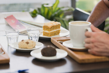 Office Colleagues Enjoying Coffee and Cake in Relaxing After-Work Break