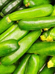 full frame green zucchini on a market stall