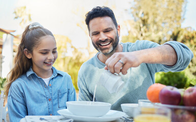 Father, girl and breakfast in garden on break, relax and cereal for wellness feast in morning. Dad, daughter and milk for food nutrition outside with family meal and peace on vacation or holiday