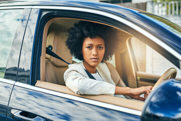 Woman, portrait and serious to drive car for license, freedom to travel and road trip adventure....