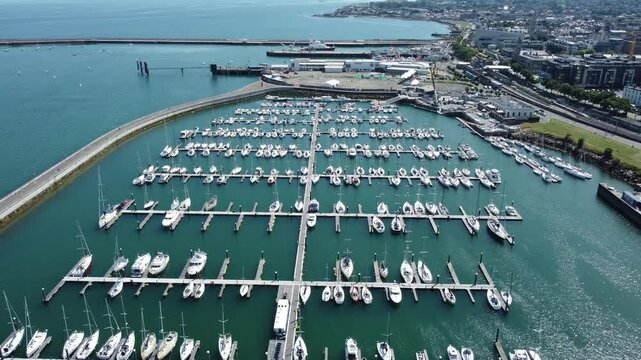 Aerial footage of Dun Laoghaire harbor on a sunny day in Dun Laoghaire suburb, Leinster, Ireland