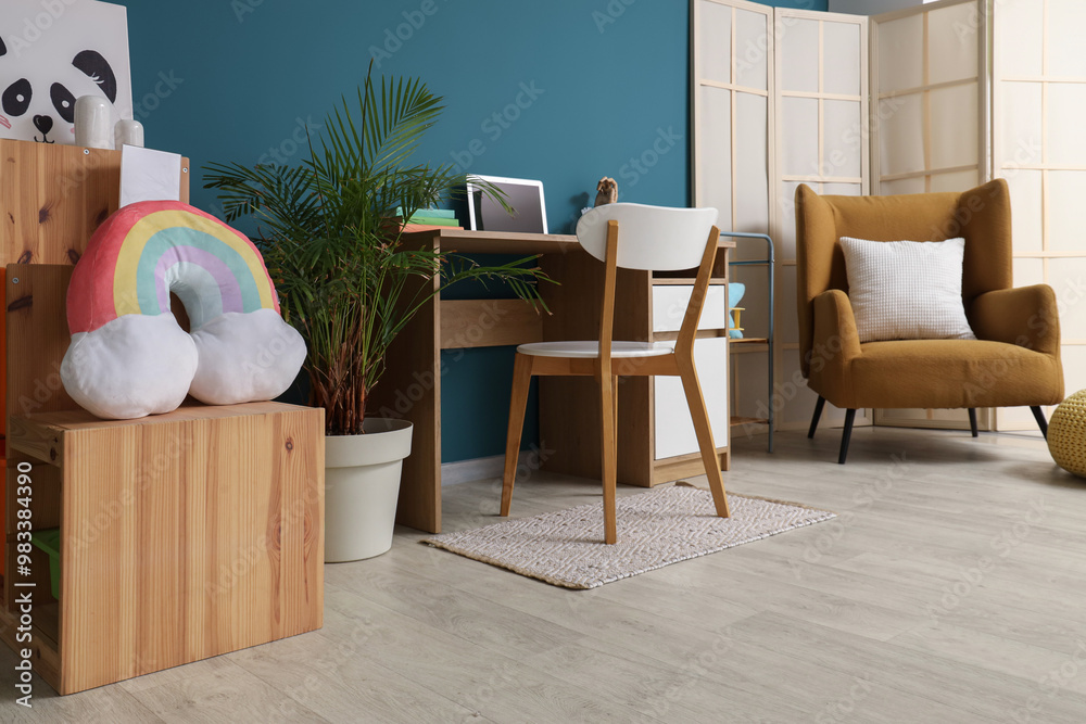 Sticker interior of children's room with study table and armchair