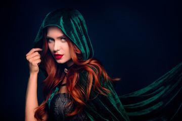 Photo of stunning girl cover face with green hood look tempting teasing isolated dark violet blue color background