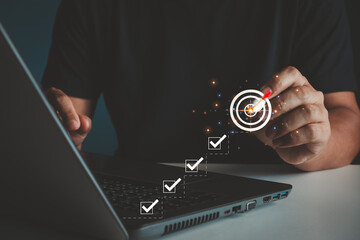 Plan steps and actions toward achieving business goals. Businessman touching on the goal of successful business growth and Steps for goal achievement and business success, targeting business concept.