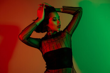 Photo of cool modern girl with closed eyes feel tempting dancing look profile side on neon color background