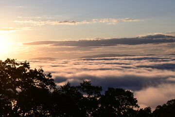 Fototapeta premium sunset over the clouds