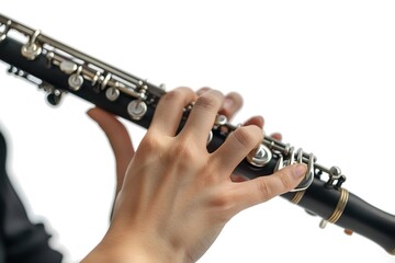 Fototapeta premium Clarinet player. Clarinetist hands playing woodwind instrument isolated on white. Musical instruments closeup
