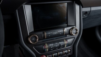 Screen and climate controls on a car