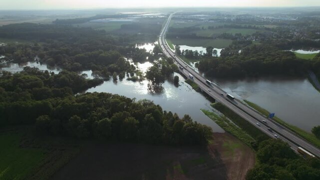 Katy Wroclawskie, Lower Silesia, Poland - September 19 2024: Aerial view of rising rivers threaten southern Poland near Wroclaw, A4 Autostrada Highway, Bystzryca river floods roads and villages