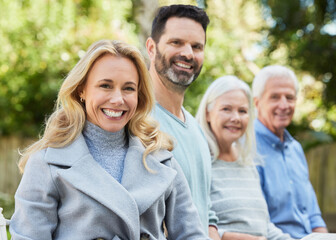 Mature woman, smile and family in garden on break, relax and bonding for wellness in morning. Couple, senior parents and reunion for breakfast outside with peace and portrait on vacation or holiday