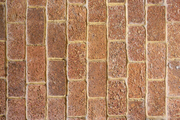 Surface of brown old brick wall background.