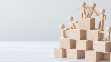 A group of wooden figures stands on a pyramid of blocks, symbolizing teamwork, collaboration, and achievement.