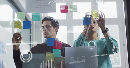 Image of financial data processing over diverse business people in office