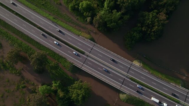 Katy Wroclawskie, Lower Silesia, Poland - September 19 2024: Aerial view of rising rivers threaten southern Poland near Wroclaw, A4 Autostrada Highway, Bystzryca river floods roads and villages