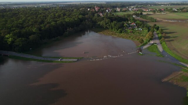 Katy Wroclawskie, Lower Silesia, Poland - September 19 2024: Aerial view of rising rivers threaten southern Poland near Wroclaw, A4 Autostrada Highway, Bystzryca river floods roads and villages