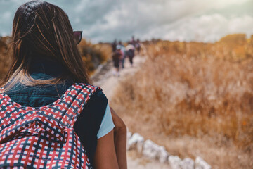 Group of tourists listening the guide explanation about Wari Archaeological Complex Ayacucho Peru