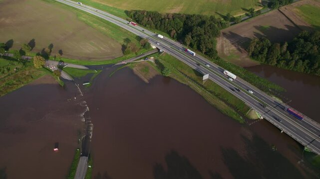 Katy Wroclawskie, Lower Silesia, Poland - September 19 2024: Aerial view of rising rivers threaten southern Poland near Wroclaw, A4 Autostrada Highway, Bystzryca river floods roads and villages