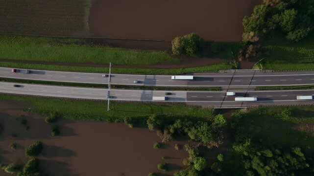 Katy Wroclawskie, Lower Silesia, Poland - September 19 2024: Aerial view of rising rivers threaten southern Poland near Wroclaw, A4 Autostrada Highway, Bystzryca river floods roads and villages