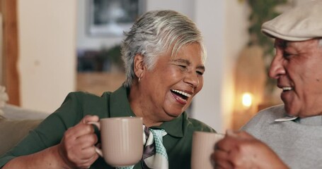 Senior couple, coffee and toast on sofa with laugh, connection and bonding with cheers in home. Woman, man and relax with drink, celebration and smile with memory on living room couch in retirement