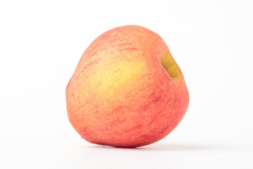 Fresh ripe apple with tiny water drops on white background