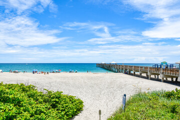 Sandy path leading to Juno Beach pier in Palm Beach County, Florida. 