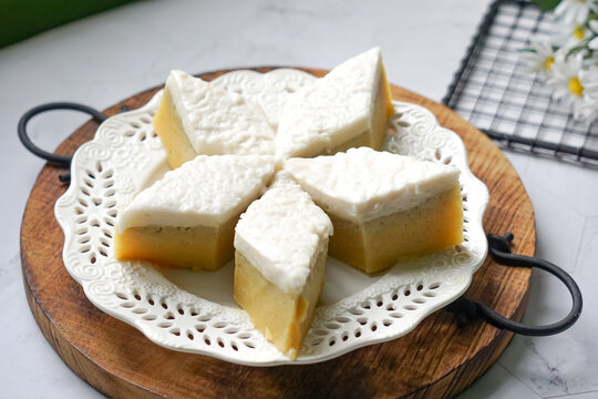 Malaysian Traditional Dessert known as Kuih Talam Pisang or Steamed Banana Cake.