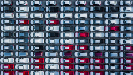 Aerial view new cars lined up in the port for import and export, Top view of new cars lined up...