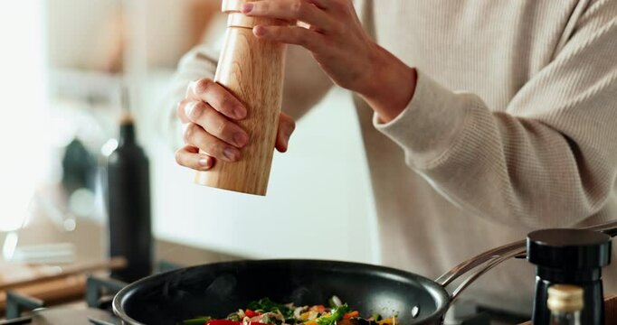Hands, salt and cooking in house for breakfast, recipe and health with nutrition, flavor and taste. Frying pan, spices and person in kitchen for healthy brunch, meal prep and seasoning food with diet
