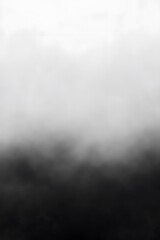 Obraz premium A simple, grayscale gradient background with a soft mist effect at the bottom edge of the canvas.