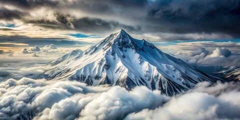 Snow-covered mountain with a cloudy sky in winter seen from above, snow, mountain, winter, aerial view, cloudy sky, cold, landscape