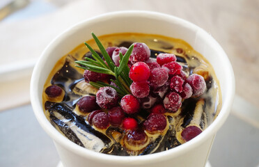 Americano coffee with Pomegranate juice, Top view