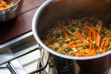Ramen is a popular Japanese noodle dish consisting of Chinese-style wheat noodles served in a flavorful broth. The broth is typically made from a base of pork, chicken, or seafood