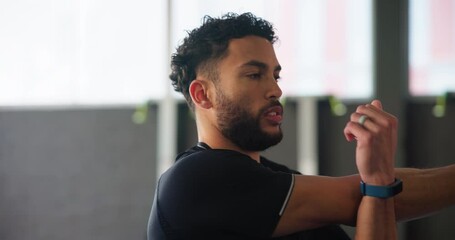Gym, class and man in fitness warm up for support, help and growth for muscle development. Stretching, workout and personal trainer at sports club with advice for body building, health and wellness