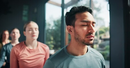 Yoga, class and peaceful with meditation in studio for holistic wellness, mindfulness and spiritual healing on floor. People, man and breathing for mental health balance, diversity and eyes closed