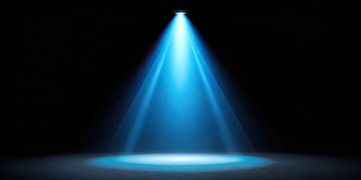 Aerial blue spotlight light beam on black background