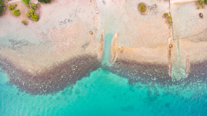 low tide on tropical beach, coral reef aerial view