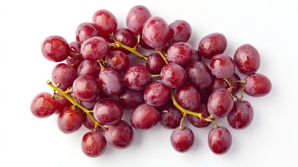 Fototapeta premium A top view of vibrant red grapes arranged elegantly on a clean white background. The image highlights the rich color and plumpness of the grapes, showcasing their natural shine and texture. 