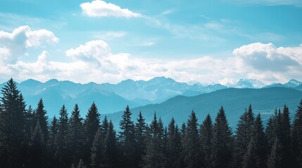 A breathtaking view of a clear blue sky above majestic mountains, surrounded by a lush forest. The scene captures the beauty of nature, with towering peaks reflecting the sunlight