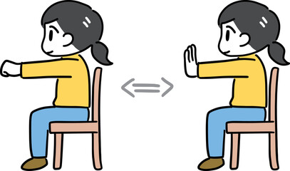 椅子に座ってグー・パーを繰り返す若い女性