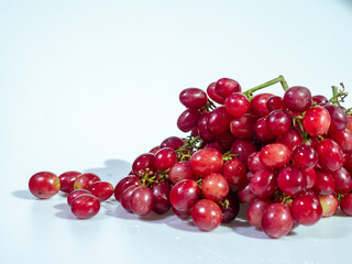 Fresh Red Grapes on a White Background