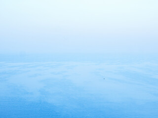 Tranquil Misty Waters with Soft Blue Tones