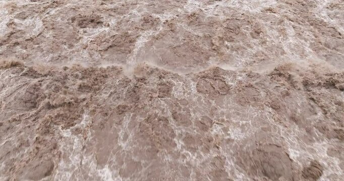 close up of flood water flowing in the river
