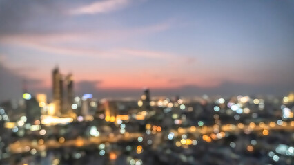 Golden hour sky with city rooftop view blur background with cityscape business corporate office building landscape blurry twilight night lights skyline nightlife bokeh for evening party